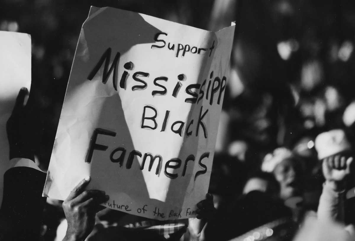 Million Man March; sign saying "Support Mississippi Black Farmers"